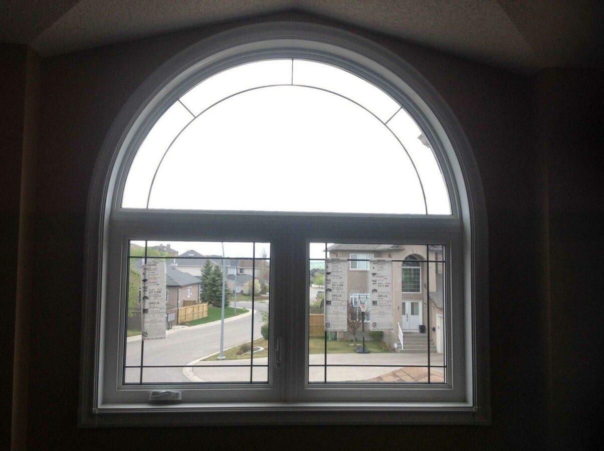 One of the most common uses for shaped windows, is on top of operable windows.