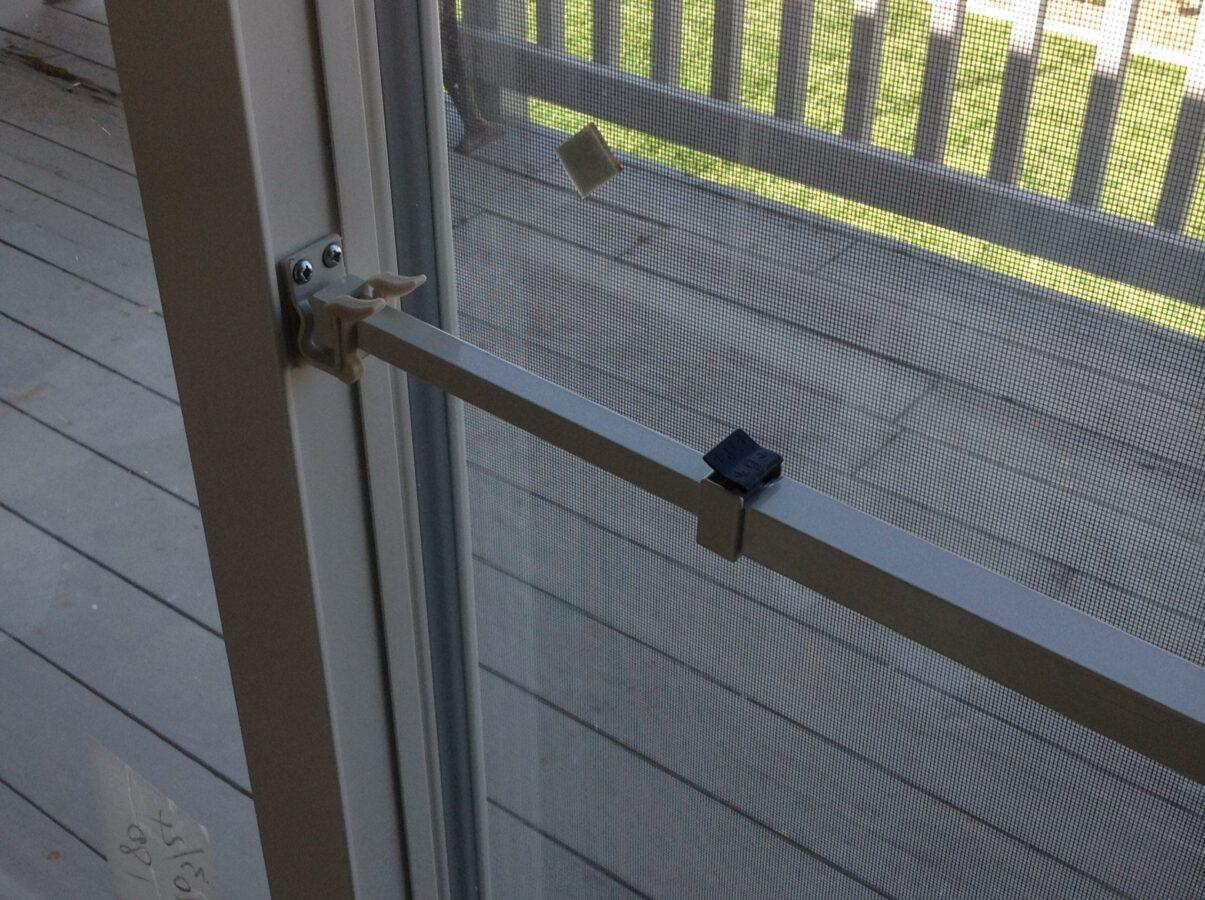 A patio door with security bar