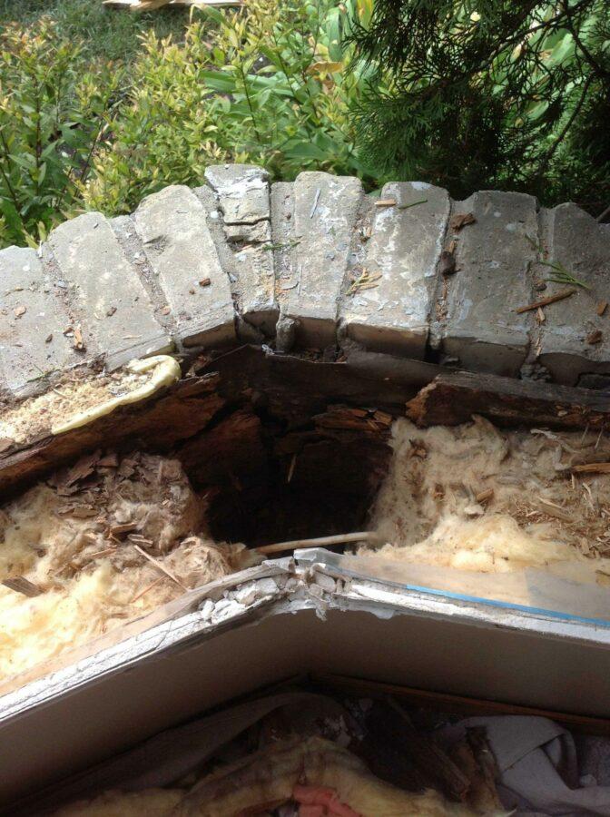 bay window with a rotting wall