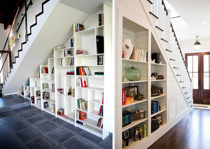 book shelf under stairs