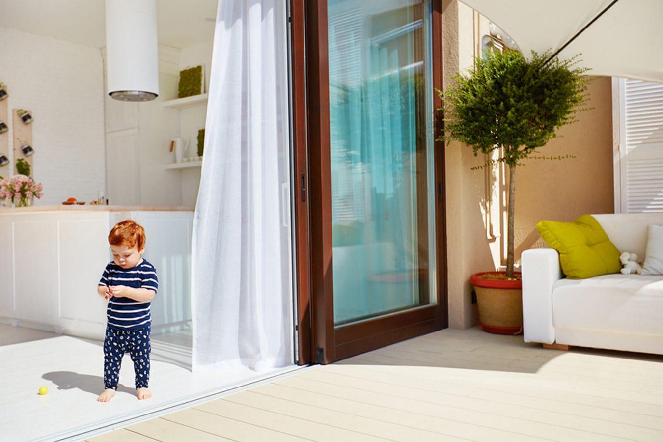 Baby Walking Through Patio Door
