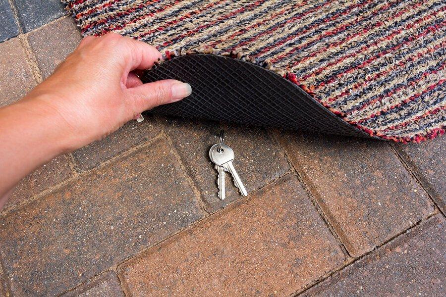 key under door mat